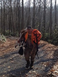 My cousin hikin out with his deer
